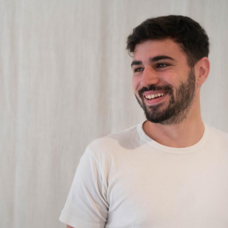 Kaveri Mehta, Lead Design Curator at Glade Subtle Path, reviewing corporate floral arrangements